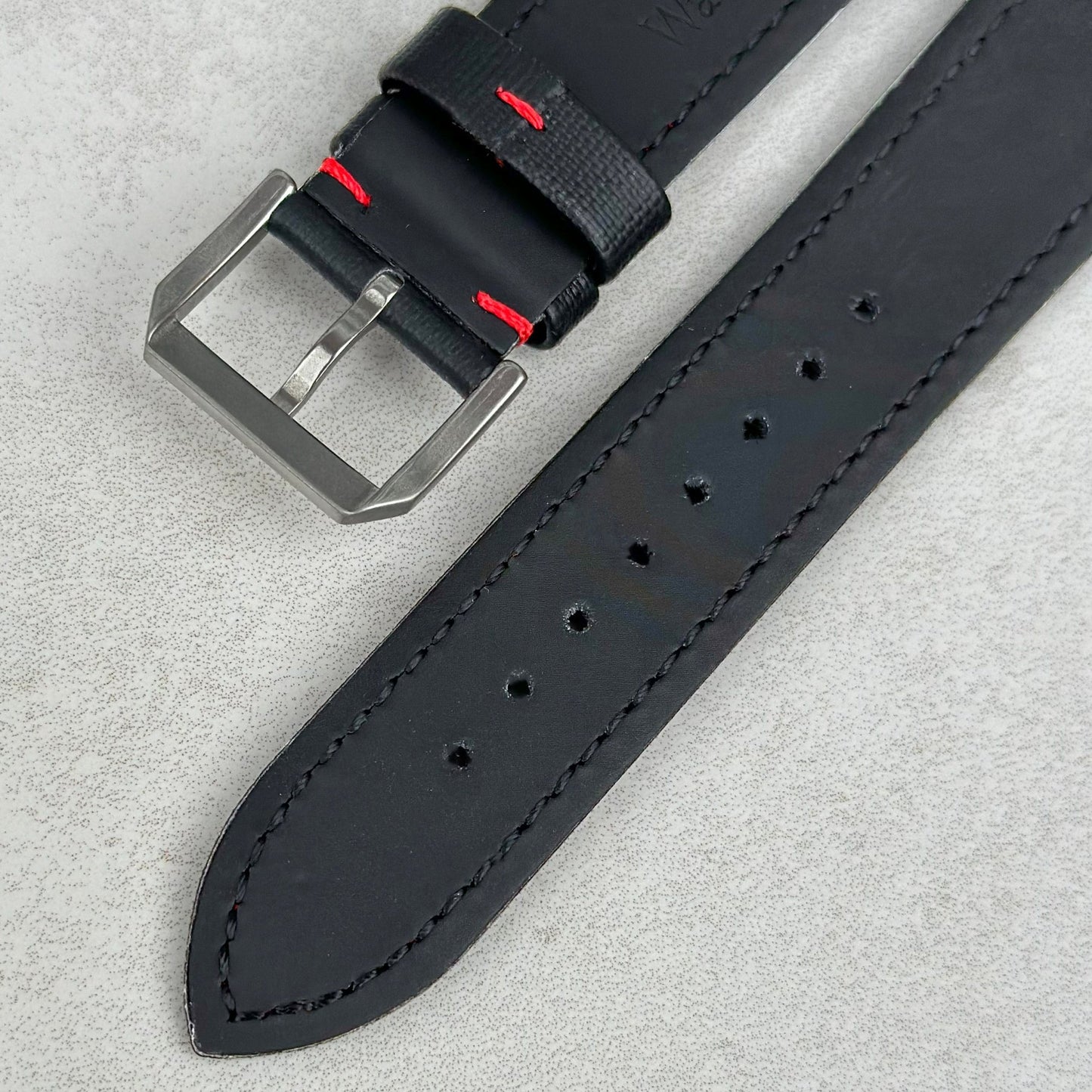 Underside of the buckle Bermuda jet black sail cloth watch strap with red stitching. Watch And Strap