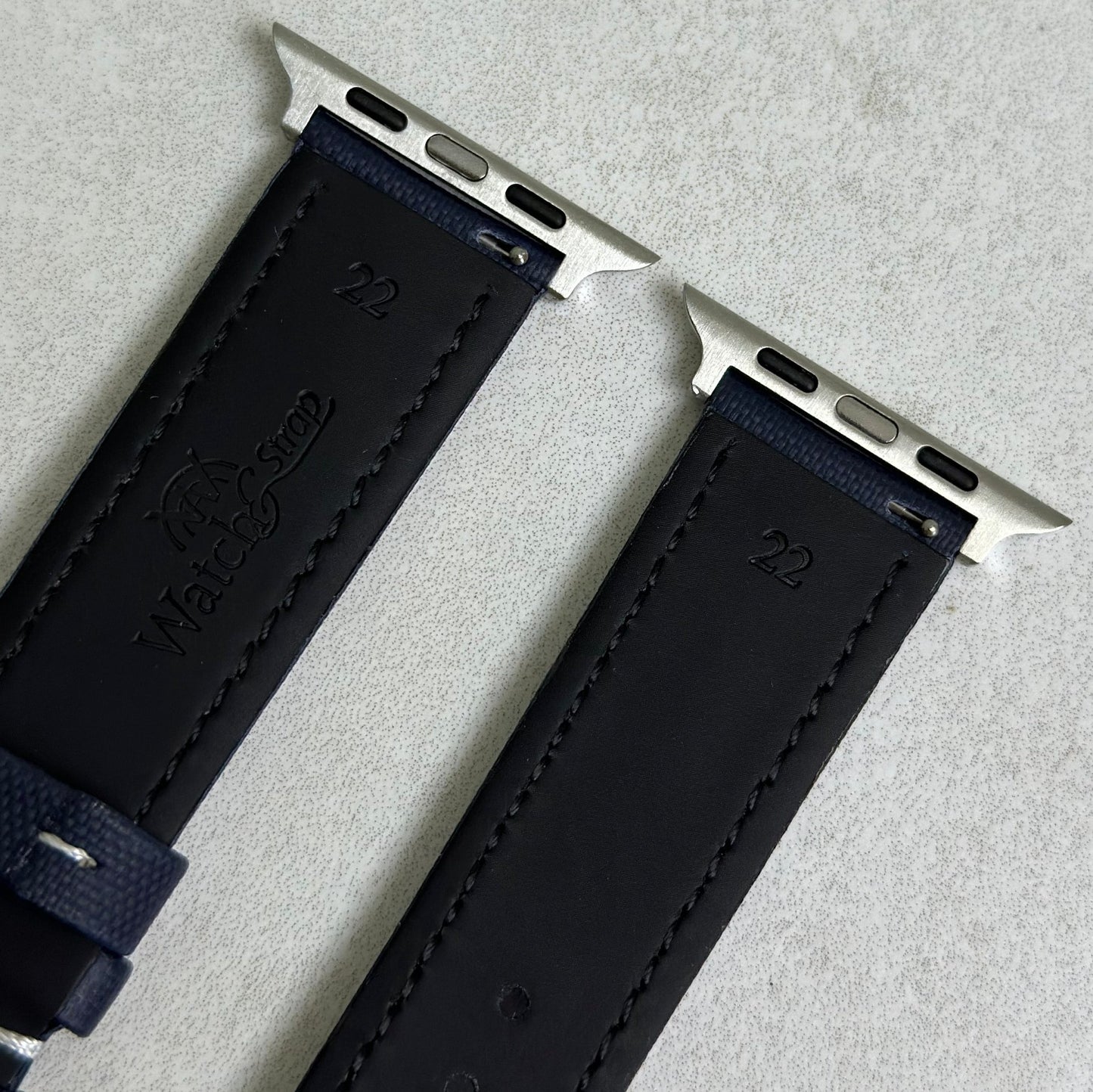 Rear of the navy blue sail cloth strap with white stitching. Black leather rear. Watch And Strap