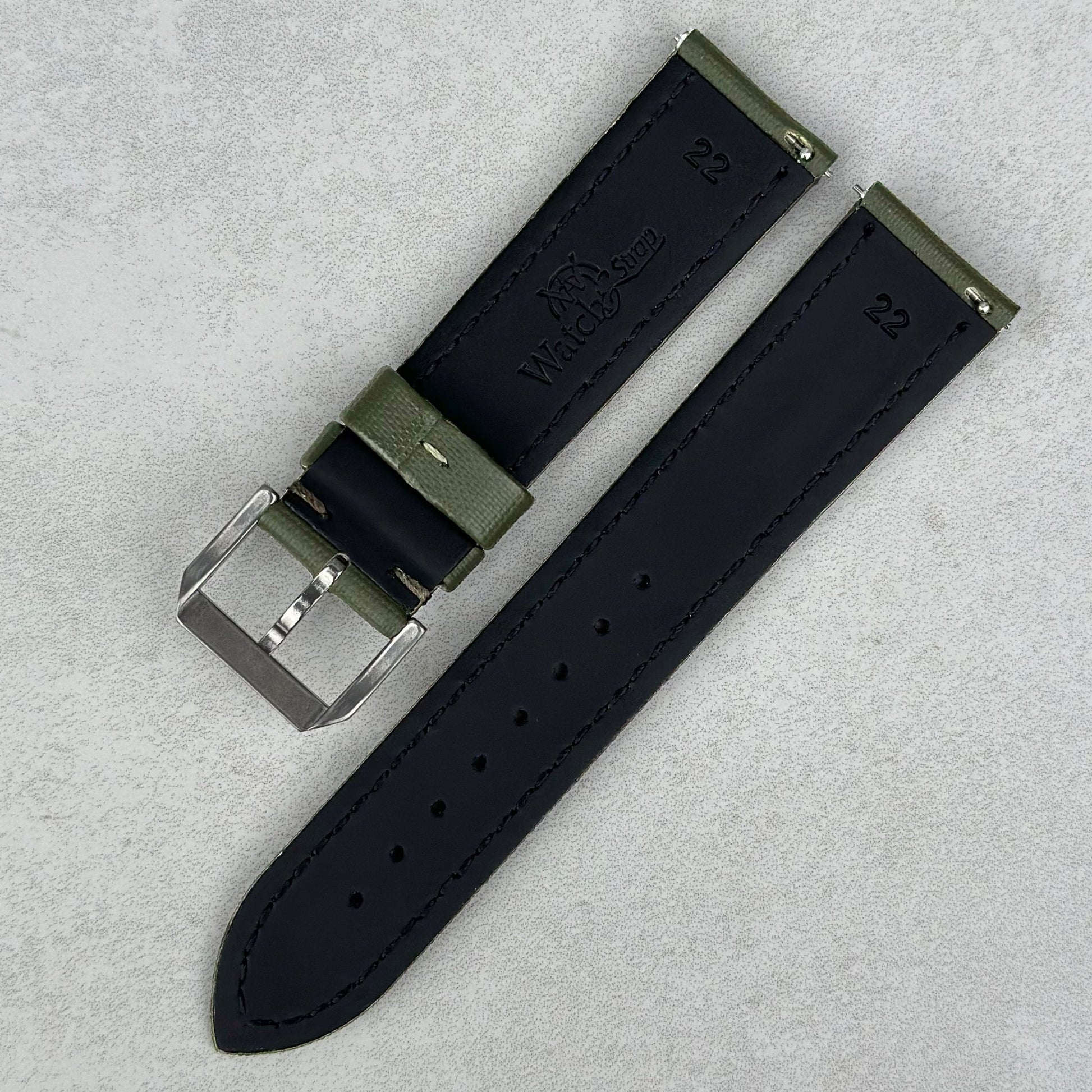 Rear of the Bermuda khaki green sail cloth watch strap. Black leather. Quick release pins. Watch And Strap.