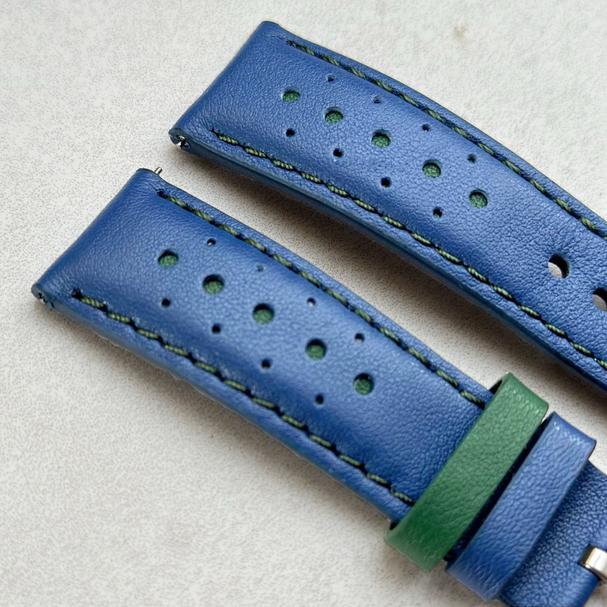 Close up of the top of the Le Mans blue and green leather watch strap. Padded leather watch strap with green stitching.