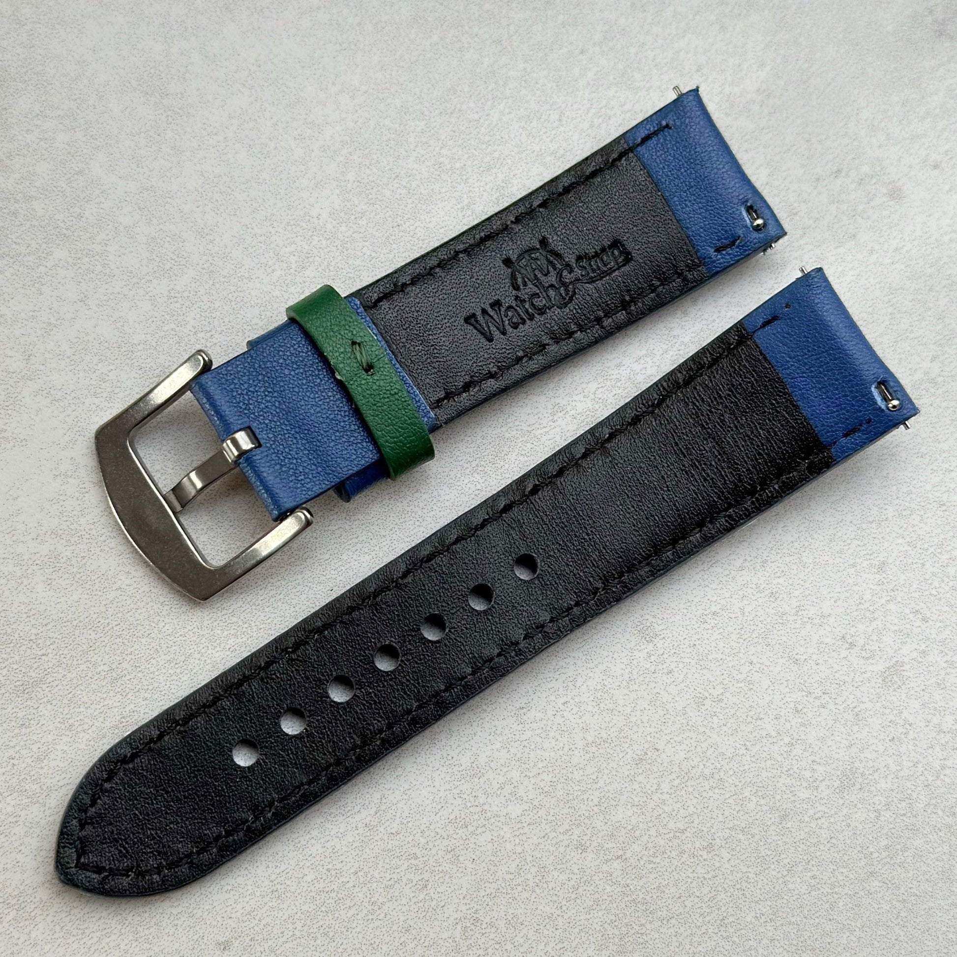 Rear of the Le Mans blue and green full grain leather watch strap. Black leather. Watch And Strap logo. Quick release pins.