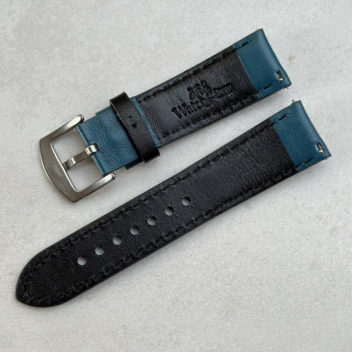 Rear of the Le Mans petrol blue and black full grain leather watch strap. Quick release pins. Watch And Strap logo debossed.