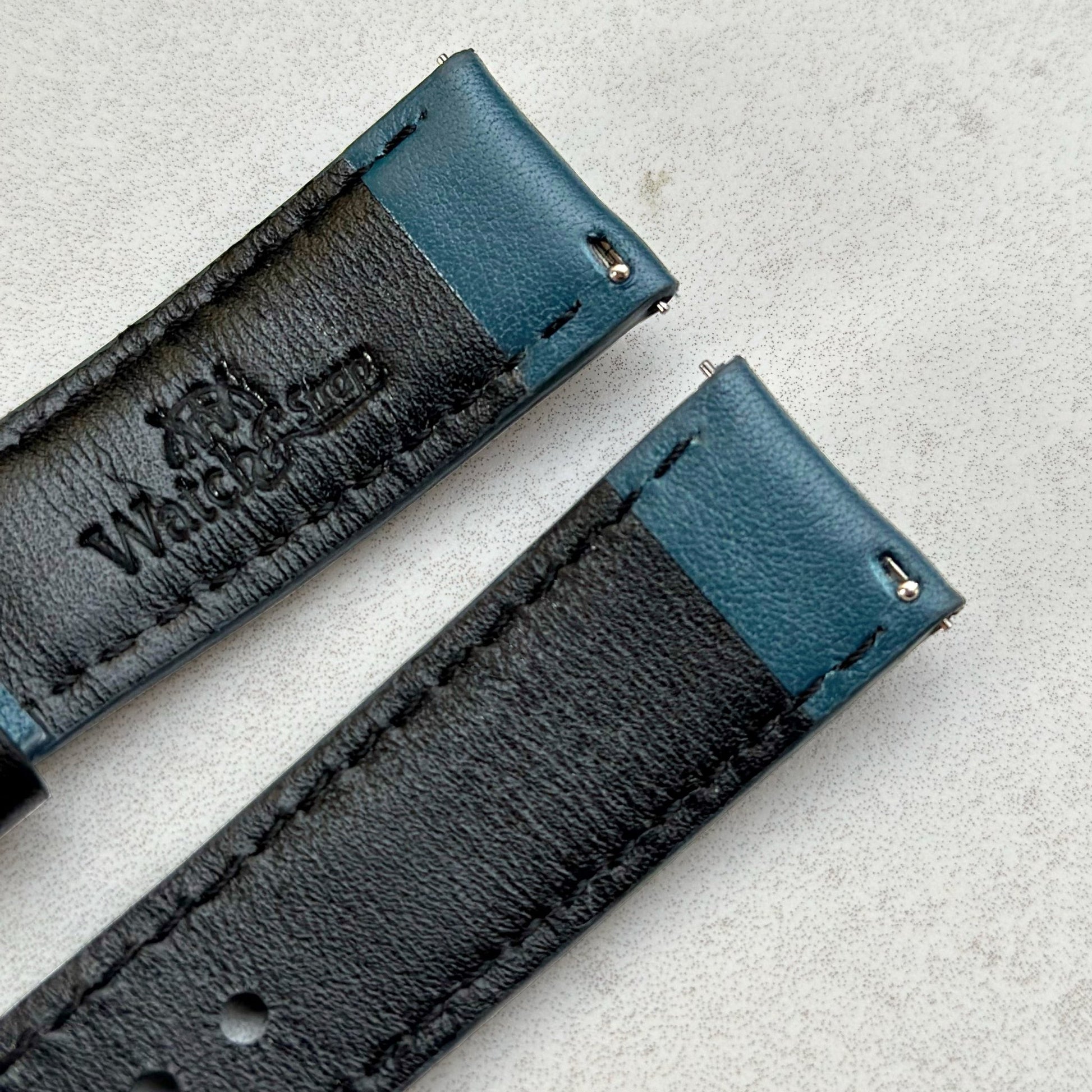 Quick release pins on the Le Mans petrol blue and black leather watch strap.