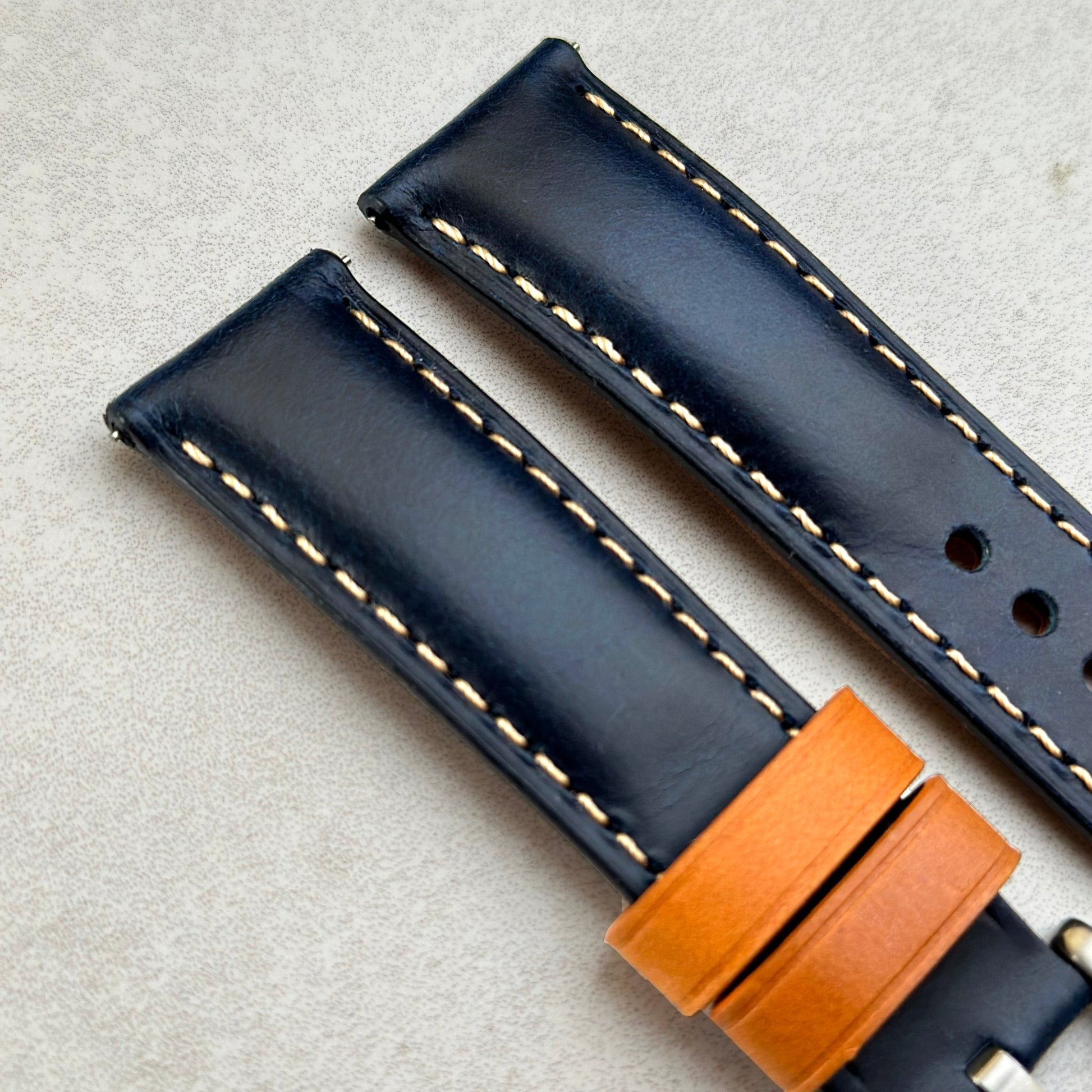 Top of the Oxford blue full grain leather watch strap. Padded leather watch strap. Ivory stitching. Watch And Strap.