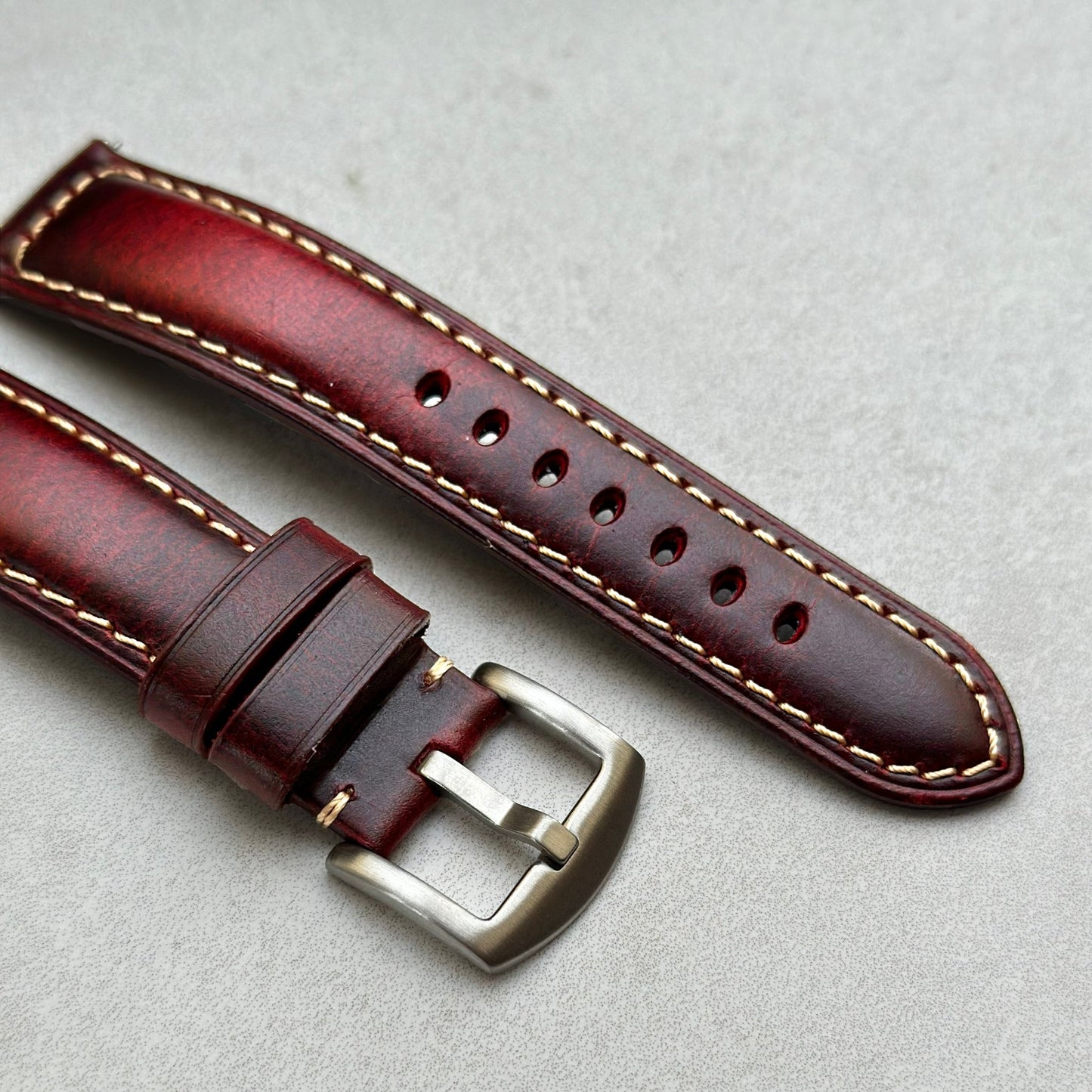 Brushed 316L stainless steel buckle on the Berlin burgundy full grain leather watch strap.