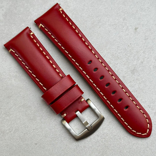 Oslo red full grain leather watch strap. Blood red leather, contrast ivory stitching. Brushed 316L stainless steel buckle. 18mm, 20mm, 22mm and 24mm lug widths.