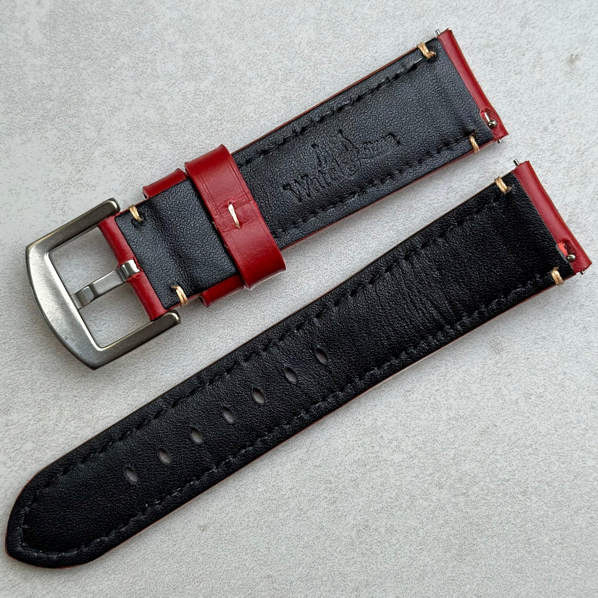 Rear of the Oslo red leather watch strap.  Watch And Strap logo, quick  release pins.