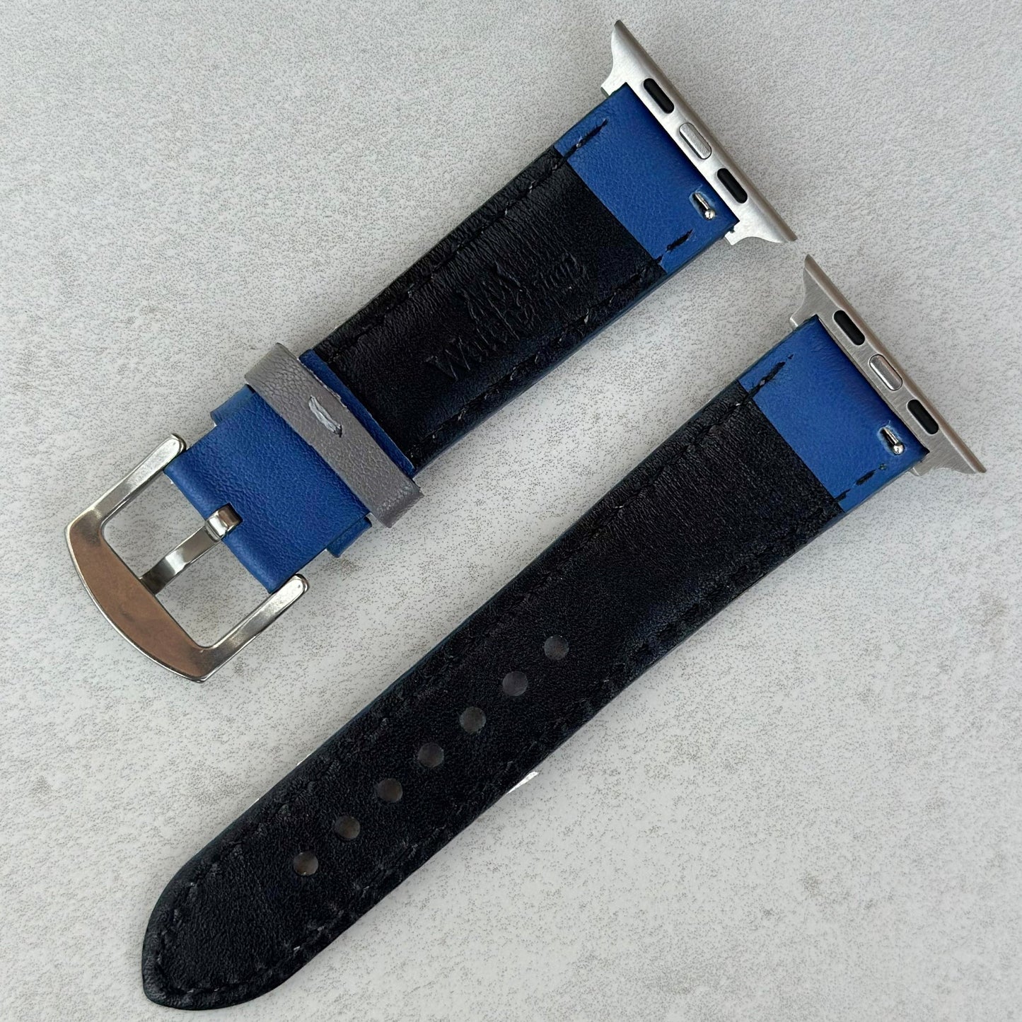 Rear of the Le Mans blue and grey full grain leather apple watch strap. Watch And Strap logo debossed.