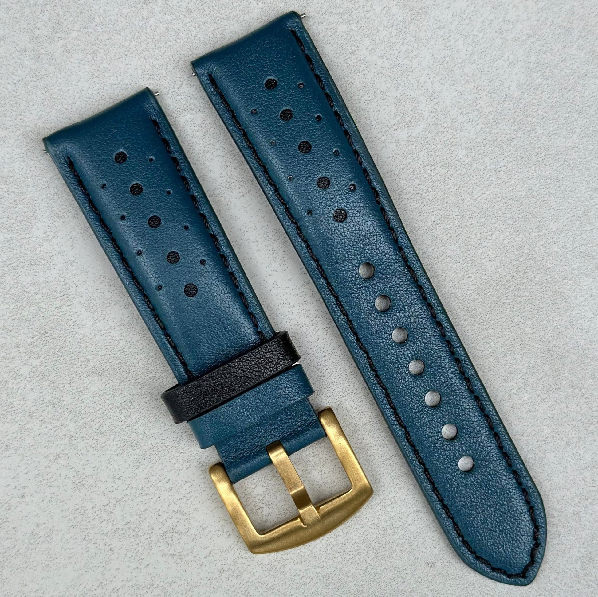 Le Man petrol blue and black full grain leather racing watch strap. PVD gold buckle.