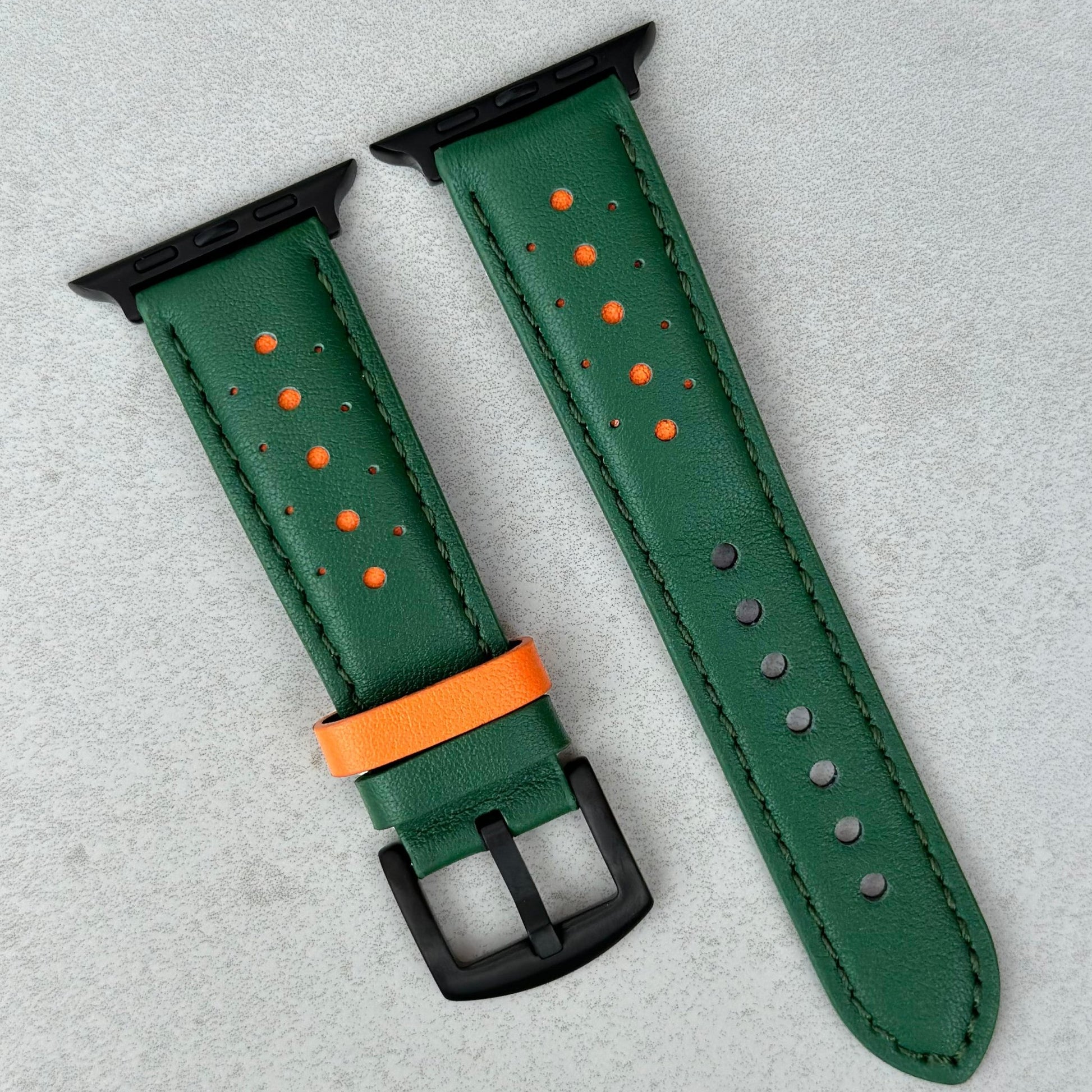 Le Mans green and orange full grain leather apple watch strap. PVD black stainless steel hardware.