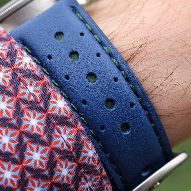 Wrist shot of the Le Mans cobalt blue and green full grain leather racing watch strap. 