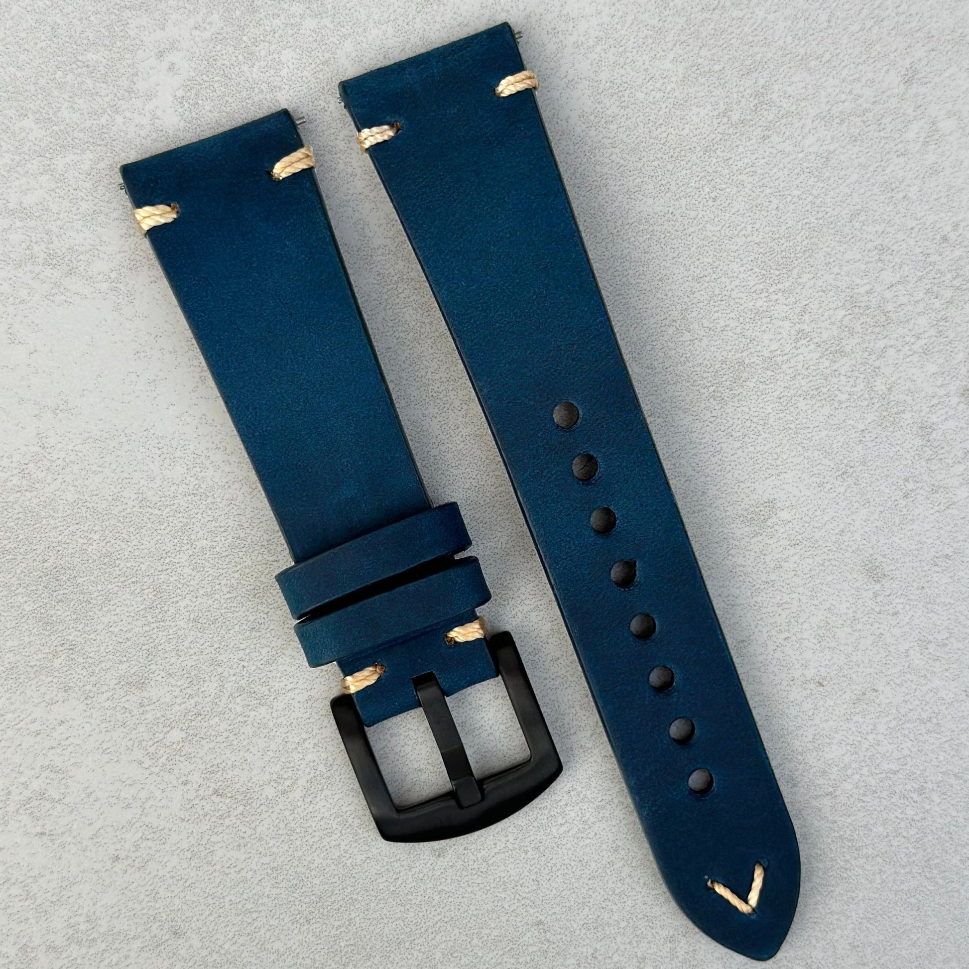 Madrid midnight blue full grain leather watch strap. PVD black 316L stainless steel buckle. Contrast ivory stitching.