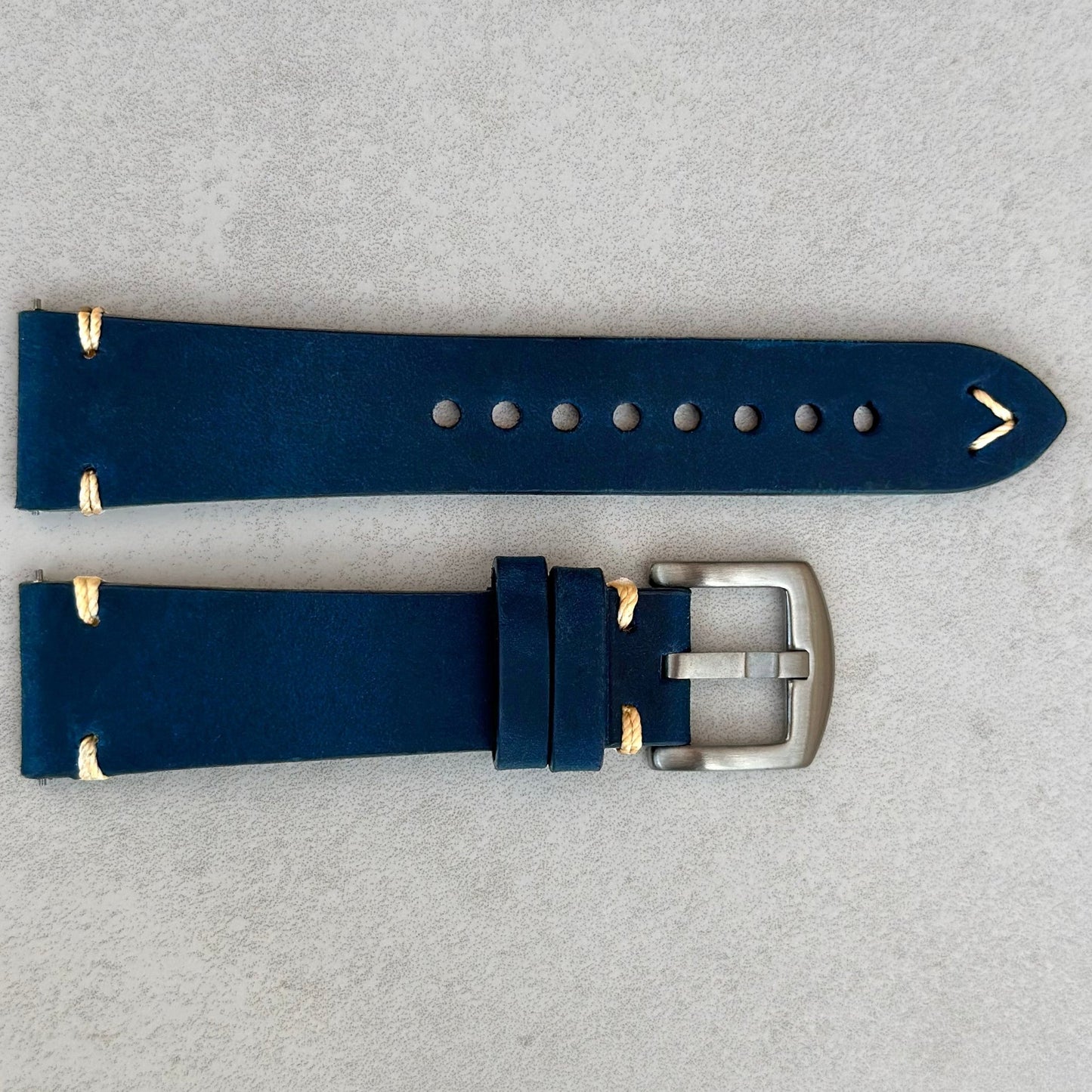 Madrid midnight blue full grain leather watch strap. Fitted with a brushed 316L stainless steel buckle. Watch And Strap
