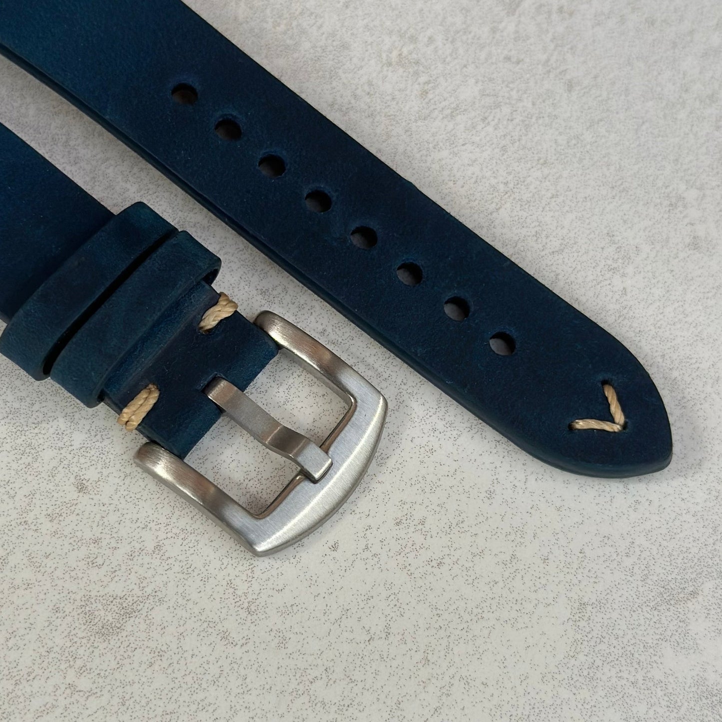 Brushed 316L stainless steel buckle on the Madrid midnight blue horse leather watch strap.