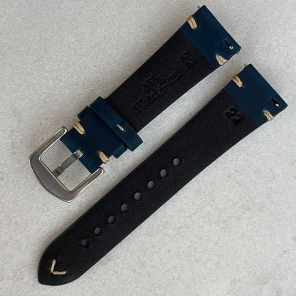 Rear of the midnight blue full grain leather watch strap. Watch And Strap logo. Quick release pins. Watch And Strap.