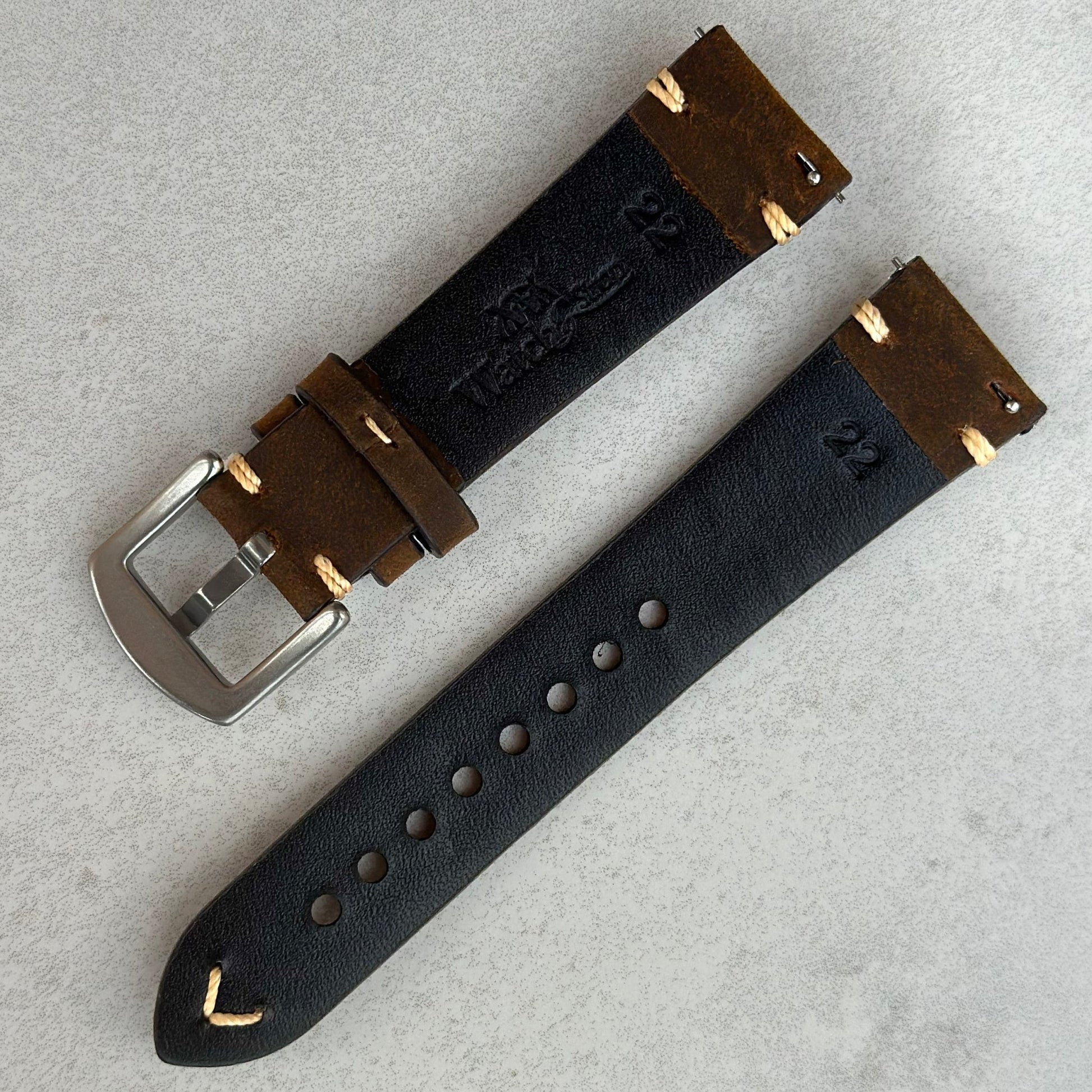 Rear of the Madrid brown full grain leather watch strap. Watch And Strap logo. Quick release pins.