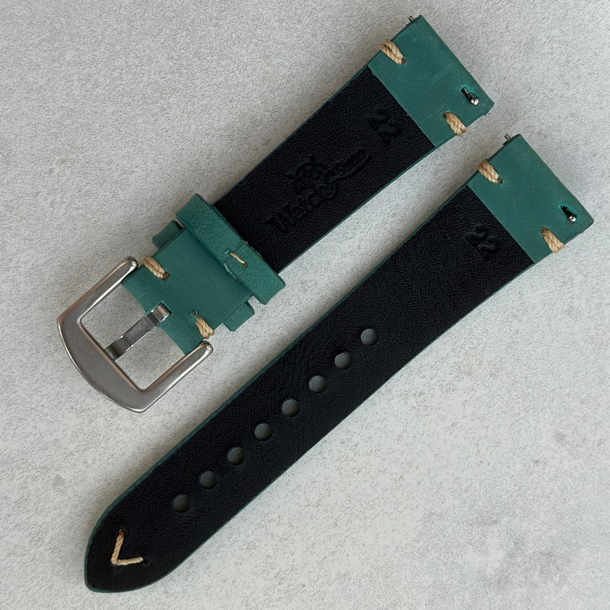 Rear of the Madrid Caribbean blue full grain leather watch strap. Quick release pins. Watch And Strap logo.