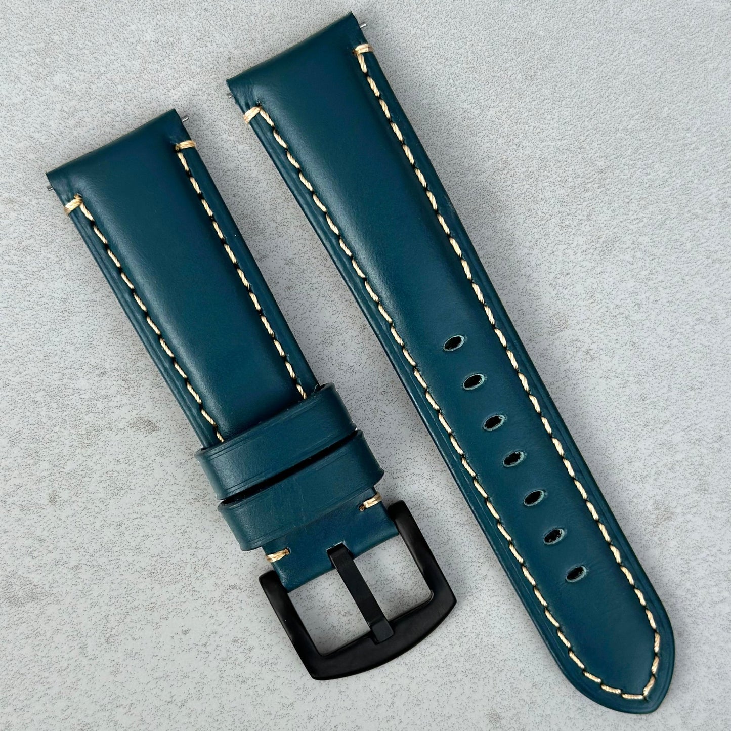 Oslo petrol blue leather watch strap with PVD black stainless steel buckle.