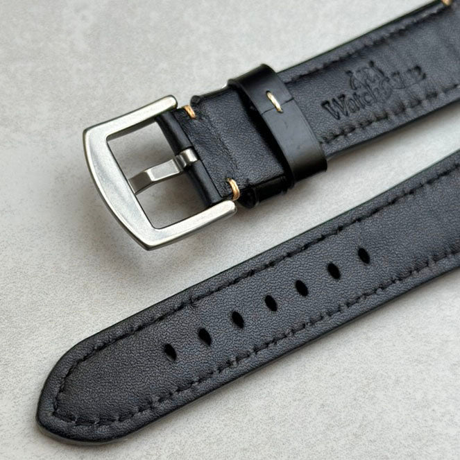 Underside of the brushed stainless steel buckle on the Oslo black full grain leather watch strap. Watch And Strap
