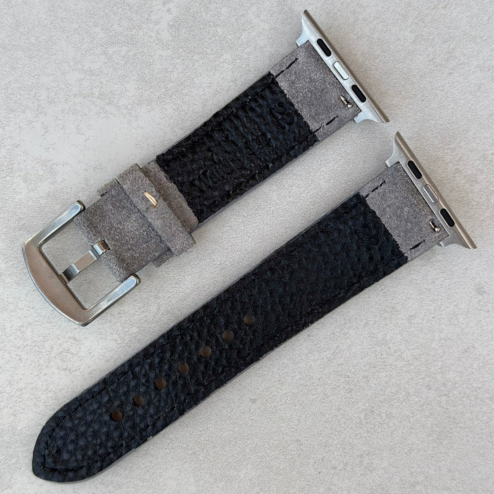 Rear of the Paris light grey suede Apple Watch strap. Ivory stitching. Watch And Strap logo.