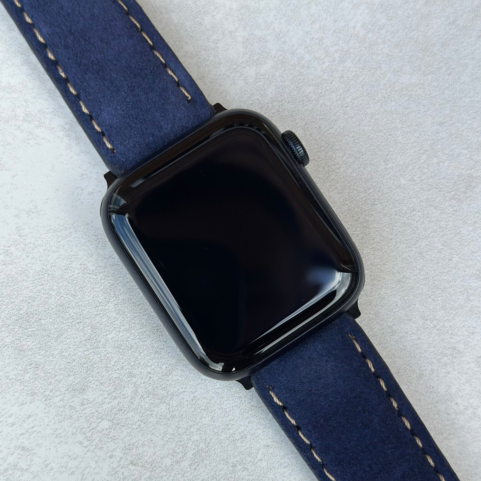 Paris navy blue suede watch strap on the Apple Watch series 9. Ivory stitching. Padded Apple Watch strap. Watch And Strap