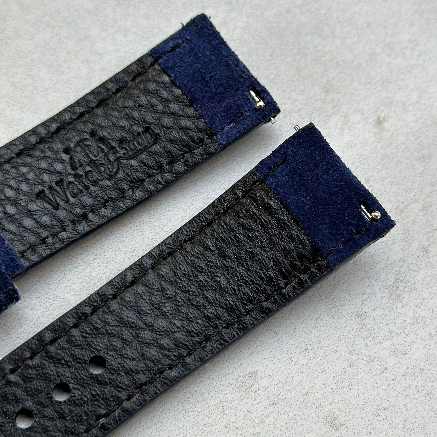 Quick release pins on the Paris navy blue suede watch strap. Watch And Strap logo.