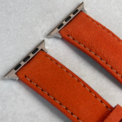 Top of the Paris orange suede Apple Watch strap. Padded suede watch strap. Stainless steel hardware. Watch And Strap.