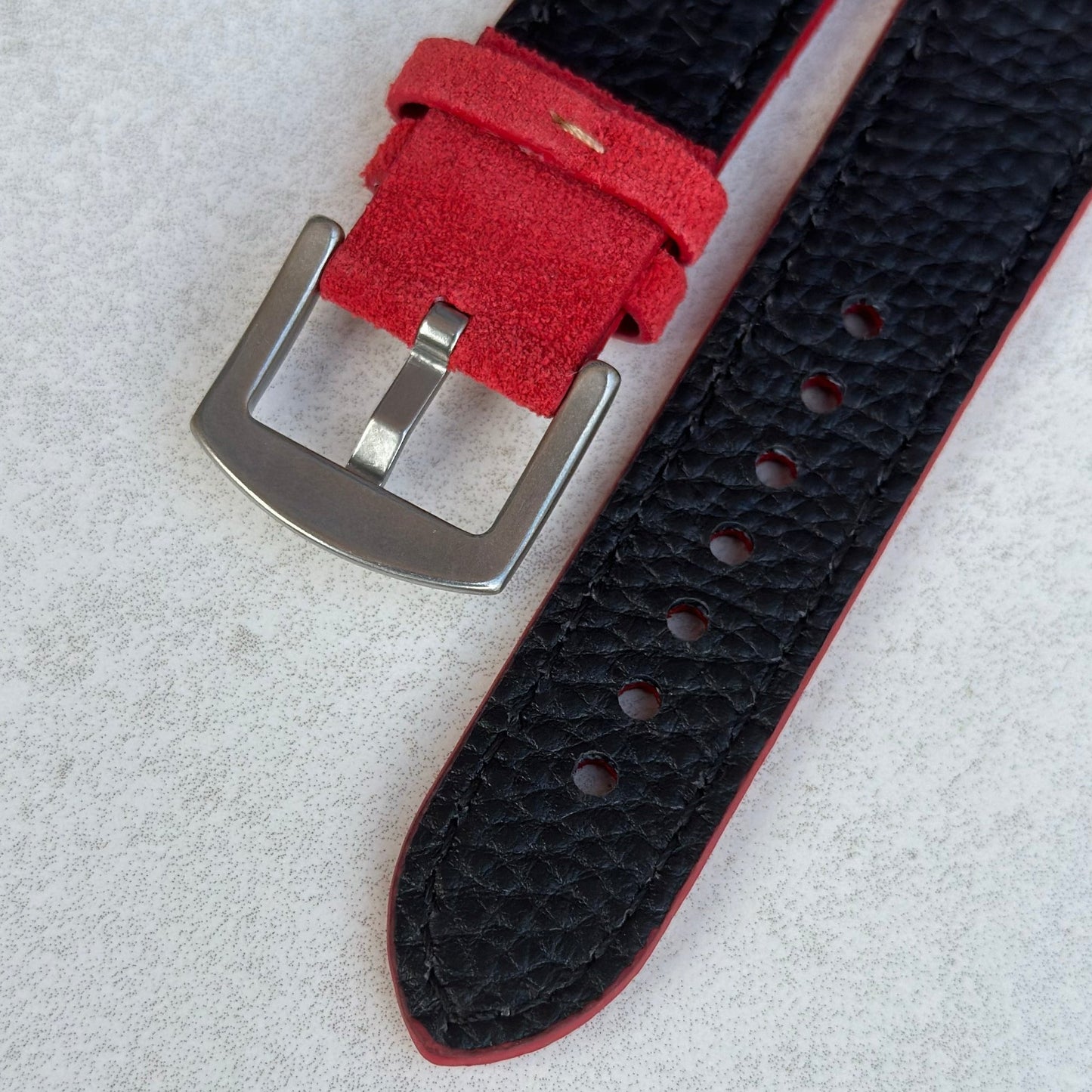 Underside of the brushed stainless steel buckle on the Paris ruby red suede watch strap. Watch And Strap.