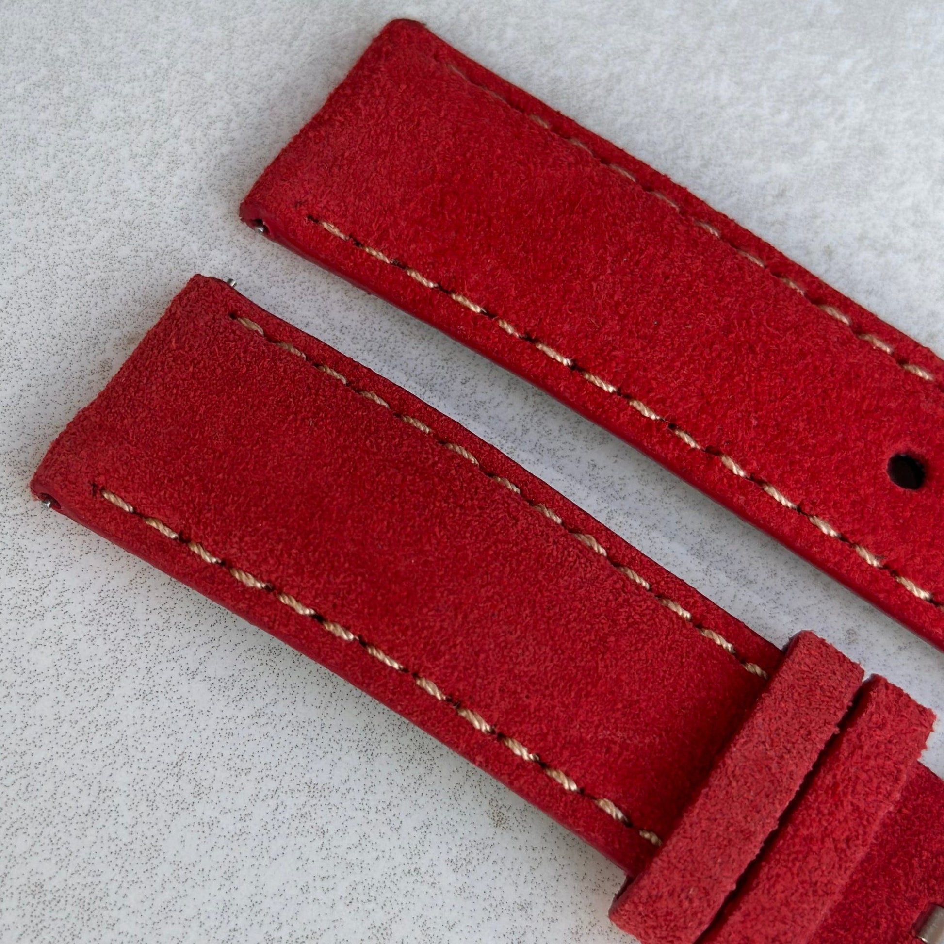 Top of the ruby red suede watch strap. Ivory stitching. Padded suede watch strap. Watch And Strap.