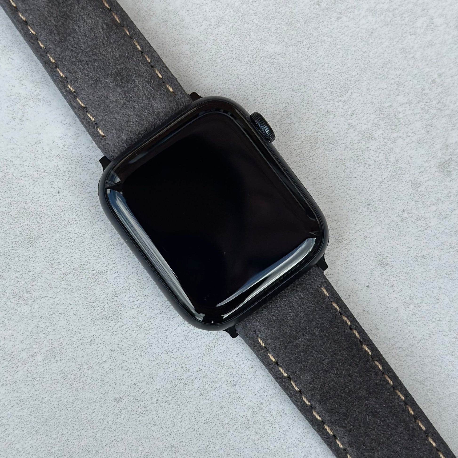Paris grey suede Apple Watch strap on the Apple Watch Series 9. Watch And Strap.