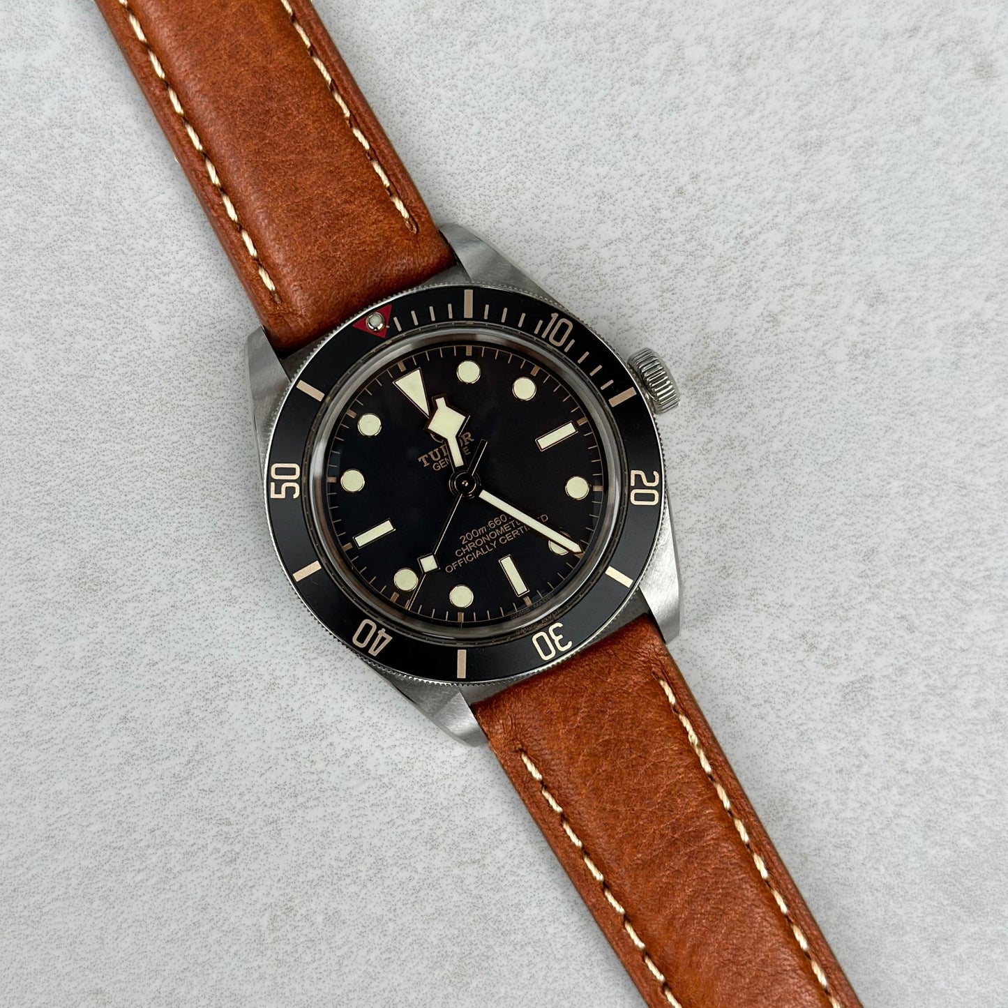 Rome copper tan Italian leather watch strap on the Tudor Blackbay 58. 20mm watch strap. Ivory stitching. Watch And Strap