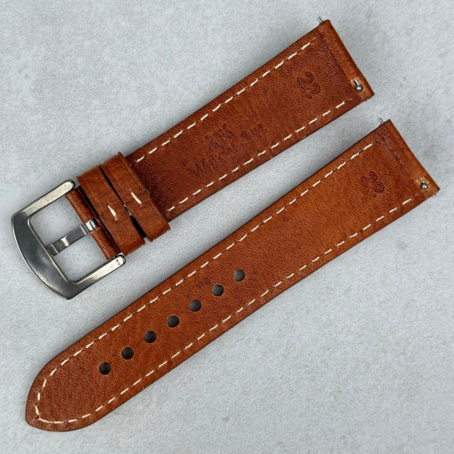 Rear of the Rome copper tan full grain leather watch strap. Quick release pins. Watch And Strap logo.